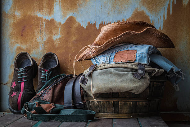 istock Clothing and equipment on table. 491116864