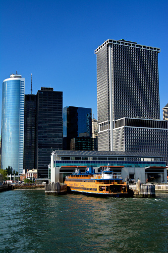 New York City, USA - August 14, 2015: A Staten Island Ferry seen at it's dock in Lower Manhattan, New York Harbor. 