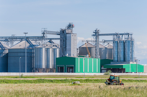 Storage facility cereals and production of bio gas; silos and drying towers