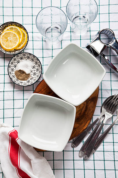 istock empty bowls, glasses, cheese grater, spices. on the tablecloth. 491119502