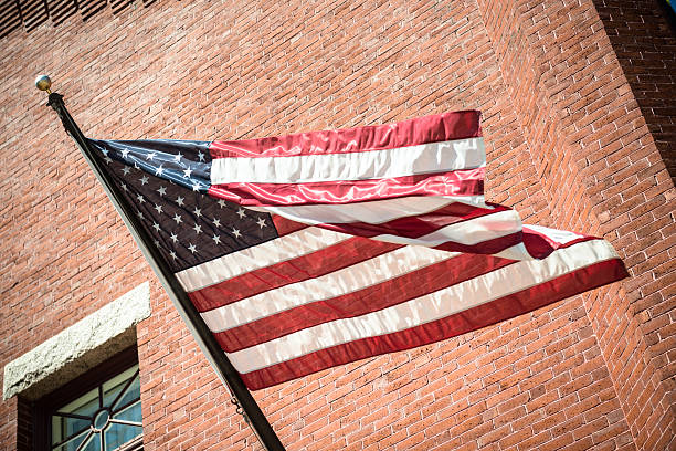 istock us national flag waving on the wind 491132118