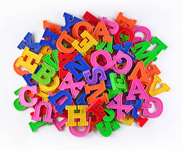istock Heap of plastic colored alphabet letters on a white 491132168