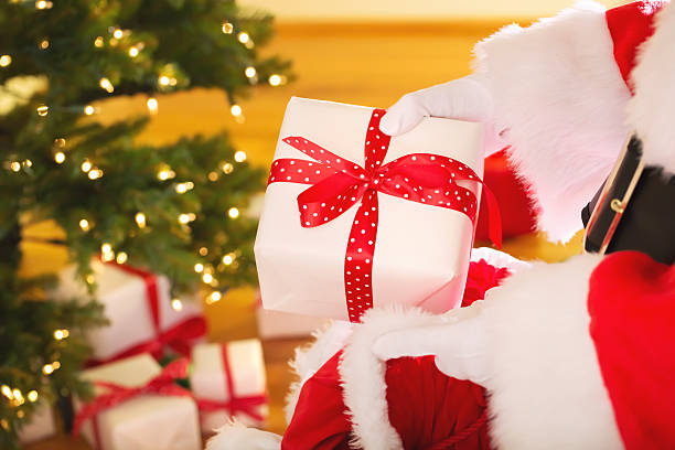 istock Santa with Christmas presents 491132664