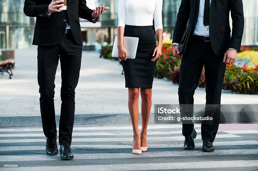 Walking to success. Cropped image of three business people crossing the street 2015 Stock Photo