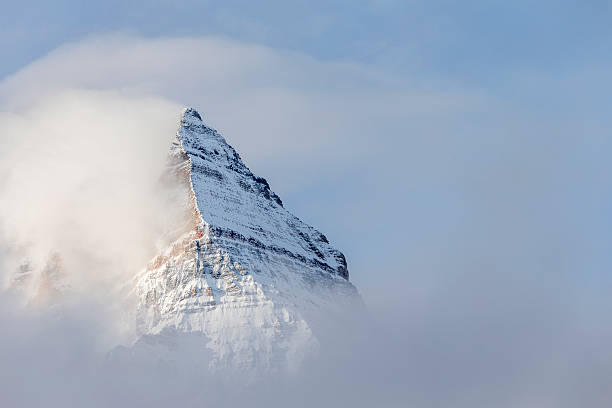 istock Pyramid Shaped Mount Assiniboine in the Fog 491134772