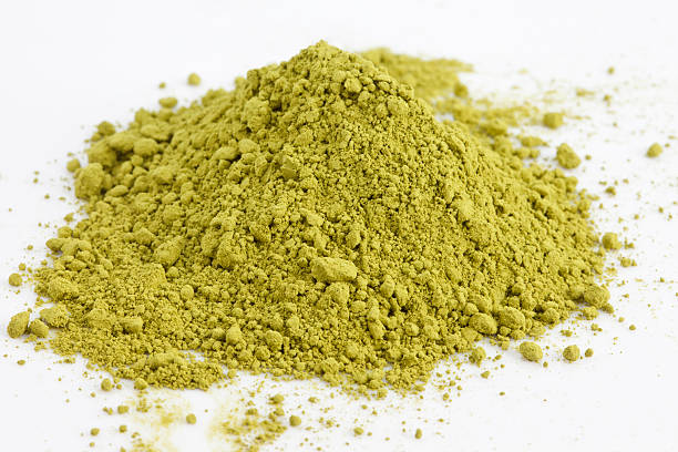 istock green powder heap on white background 491138380