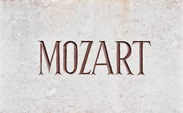 MOZART Letters The name Mozart written in capital letters and carved in stone. wolfgang amadeus mozart photos stock pictures, royalty-free photos & images