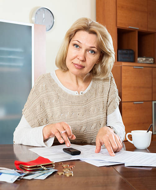 istock Serious  woman  with documents money 491142709