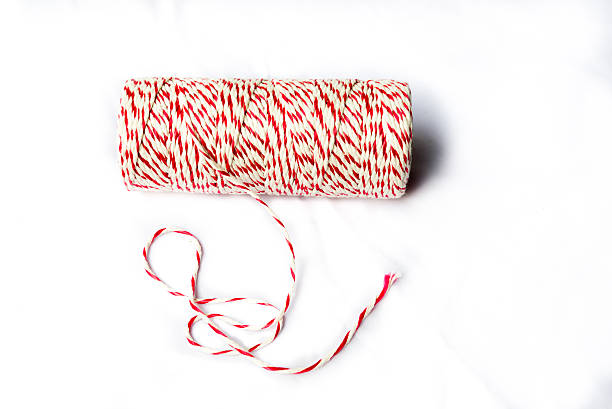 istock Red and white baker's twine spool 491144531