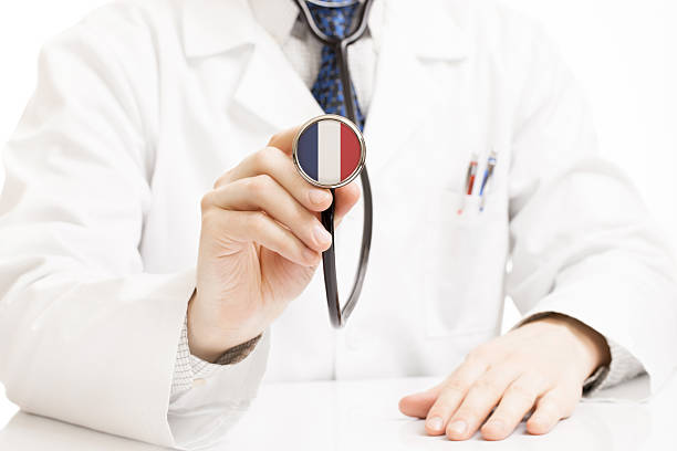 Doctor holding stethoscope with flag series - France stock photo