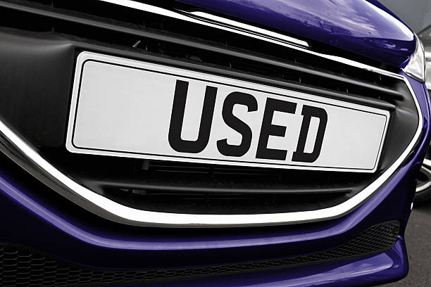 Used car Number plate Number plate of a used cars for retail sale on a motor dealers forecourt all logos removed vehicle accessory stock pictures, royalty-free photos & images