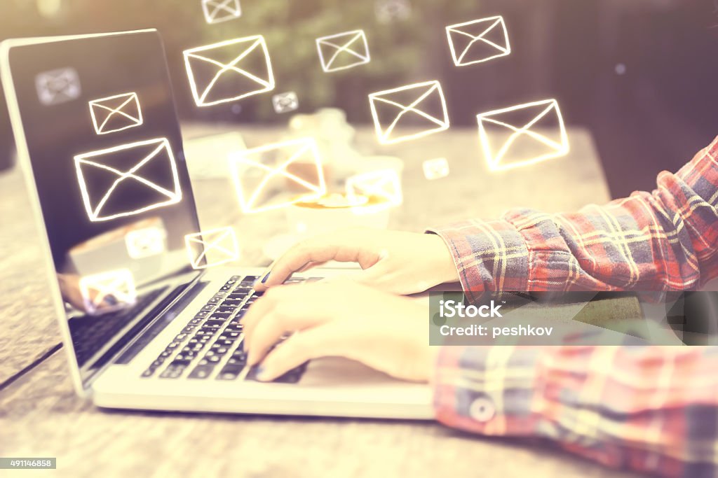 Email concept with girl's hands 2015 Stock Photo