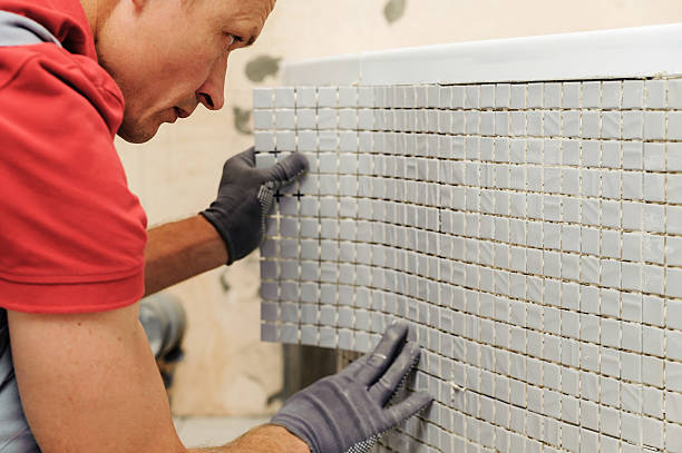 istock Installation of mosaic tiles. 491147114