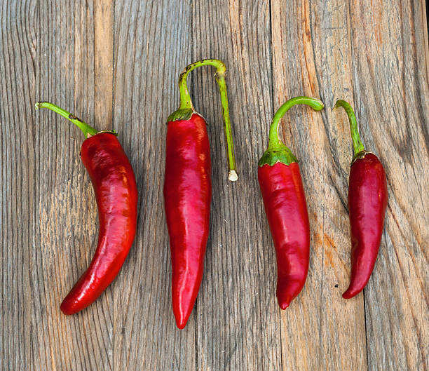 istock Chili pepper on a wooden surface 491149404