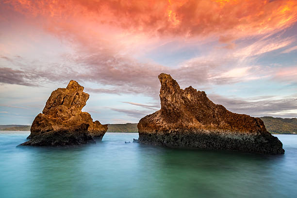 istock Sunrise with two huge rocks near Cayo Levantado 491149650
