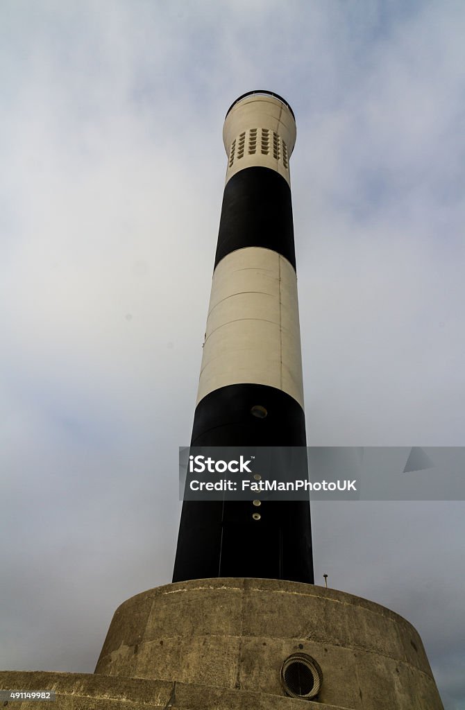 Modern lighthouse, Dungeness New Lighthouse Black and white banded modern lighthouse. Dungeness New Lighthouse, Kent, England, United Kingdom. 2015 Stock Photo Modern lighthouse, Dungeness New Lighthouse Black and white banded modern lighthouse. Dungeness New Lighthouse, Kent, England, United Kingdom. 2015 Stock Photo