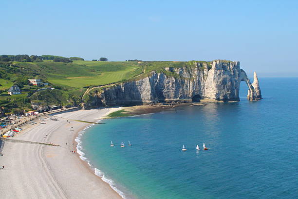 istock Cliffs of etretat, France 491150190