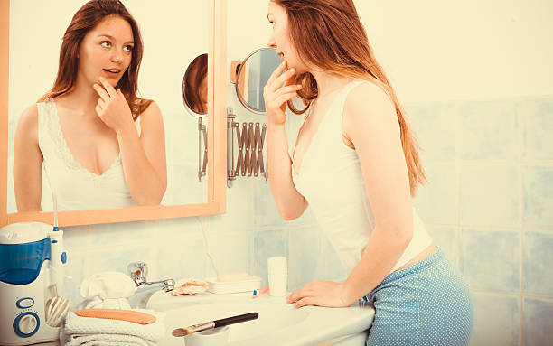 istock Woman without makeup in bathroom. 491167186