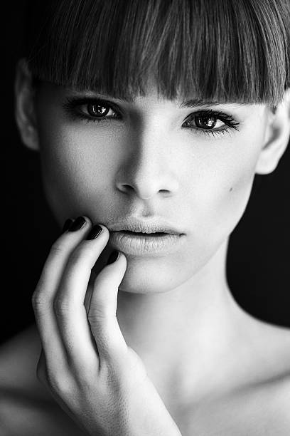 istock Young beautiful woman on dark background 491167830
