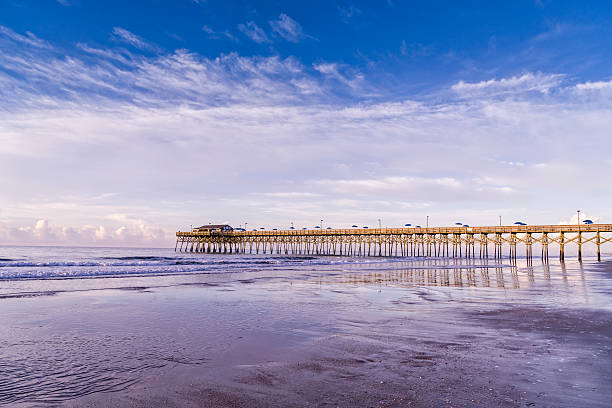 istock Beach morning with fishing pier 491168014