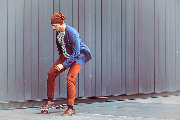 istock Young casual man riding a skateboard in the urban environment. 491168220