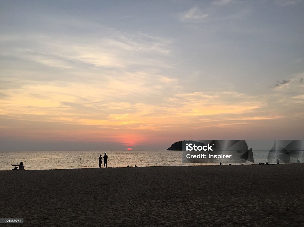 Kata beach sunset with tourists 2015 Stock Photo