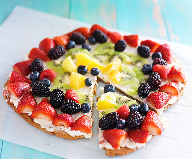 colorful fruit pizza stock photo