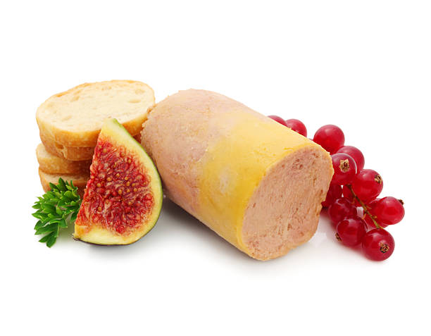 Foie Gras Foie Gras with fig, red currant and croutons isolated on white foie gras stock pictures, royalty-free photos & images