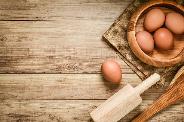 istock Kitchen utensils and baking ingredients on wood background, copy-space. 491187806