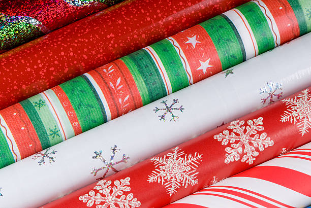 Holiday Gift Wrap Papers Rolls of Holiday Gift Wrap Paper. christmas paper photos stock pictures, royalty-free photos & images