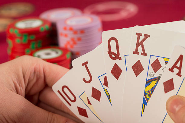 istock Close Up Of Card Hand On Casino Table 491203043