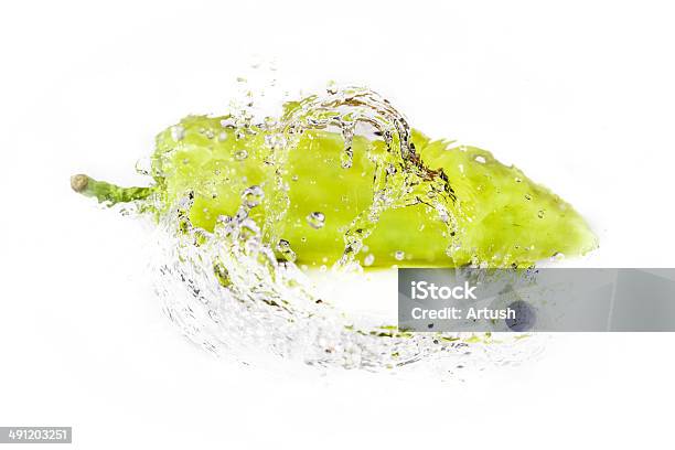 Green Pepper With Water Splash Isolated Stock Photo - Download Image Now - Bubble, Chili Pepper, Cleaning