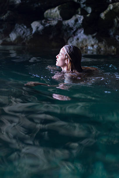 istock Young Woman In A Natural Pool 491204325
