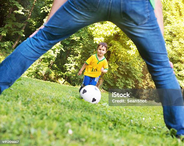 Child Playng Soccer With Brazilian Tshirt At The Park Stock Photo - Download Image Now