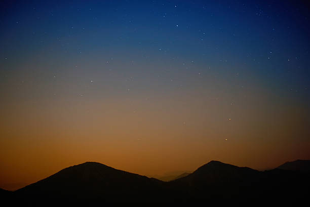 istock Red dark night sky with stars 491204843