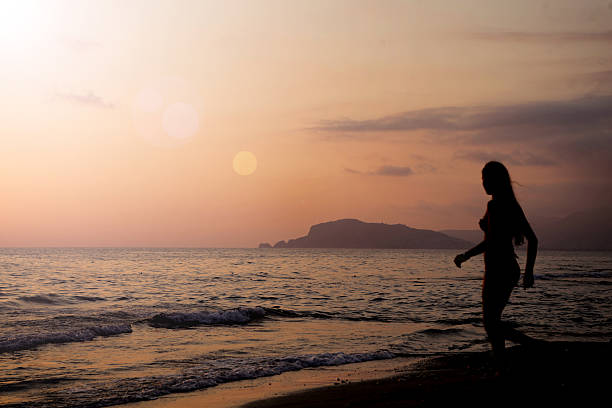 istock girl by the sea 491204959