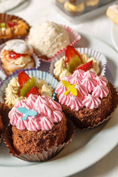 istock Cakes with cream, grated chocolate, sugar powder 491206663
