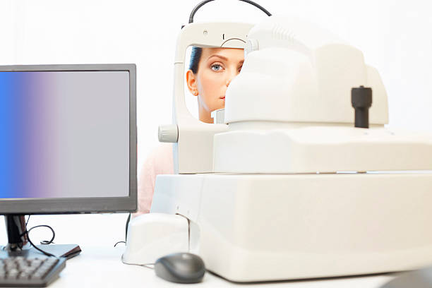 istock At the optician    Young women patient  having a eye checkup 491207382