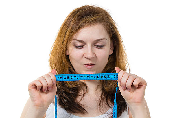 istock Girl with meter in her hands 491207677