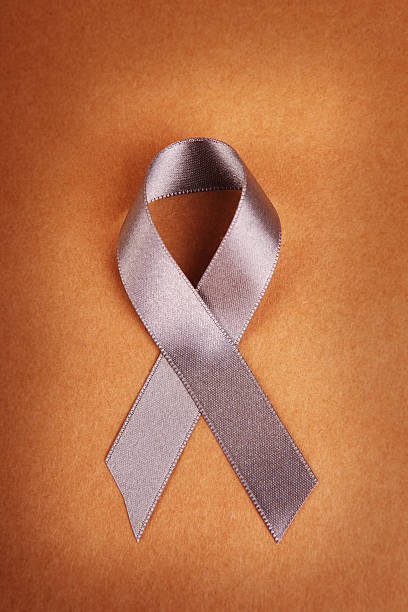 istock Grey Awareness Ribbon on Brown 491208839