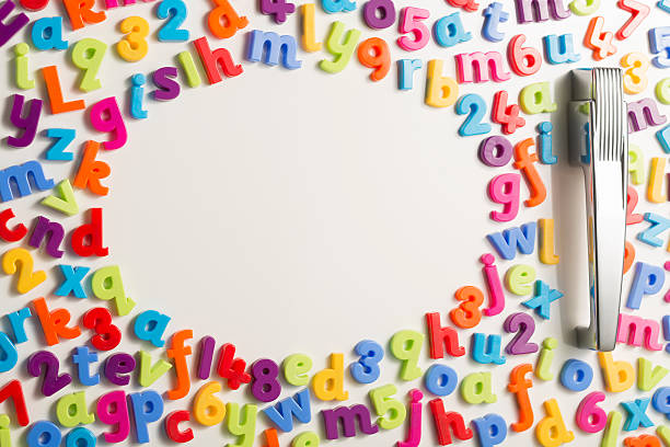 Refrigerator door with magnetic letters and blank space  http://www.primarypicture.com/iStock/IS_Fridge.jpg magnetic letter stock pictures, royalty-free photos & images