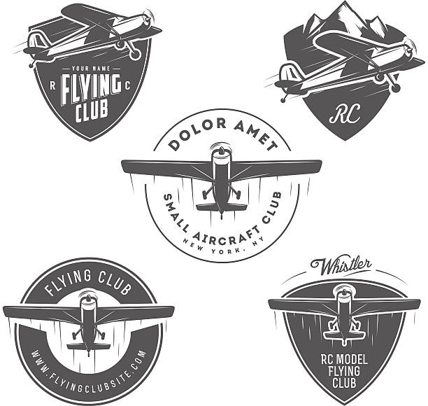 Airplane related emblems, labels and design elements Light and RC airplane related emblems, labels and design elements. air show stock illustrations