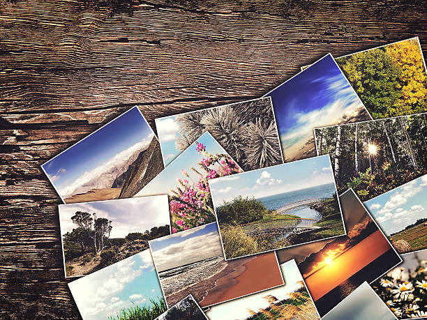 istock old vintage  photos on a wooden background 491219640