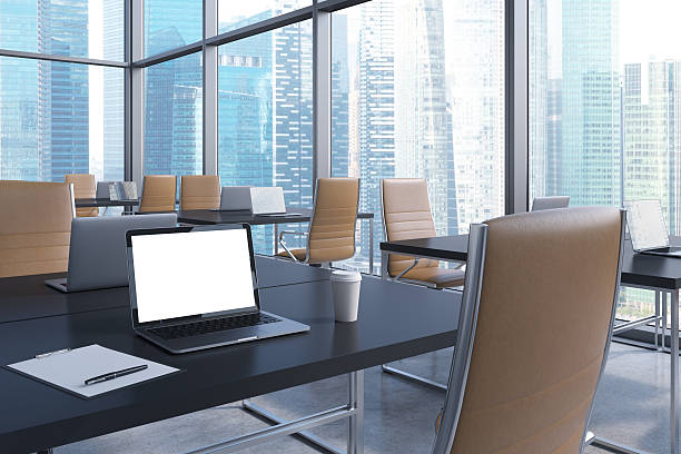 istock Workplaces in a modern office with panoramic view of Singapore 491219798