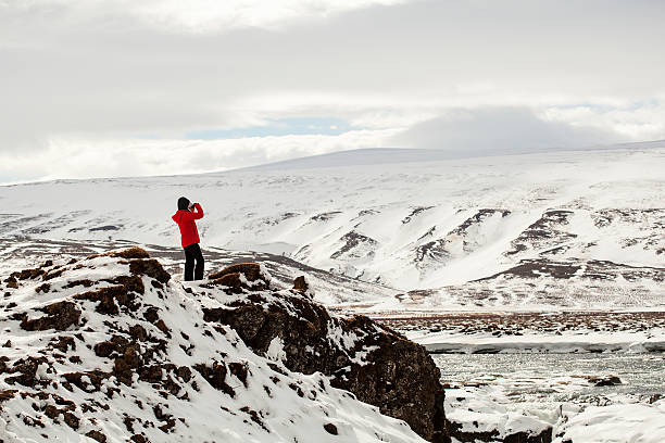 istock Hiker at mountain top of waterfall Godafoss 491222890