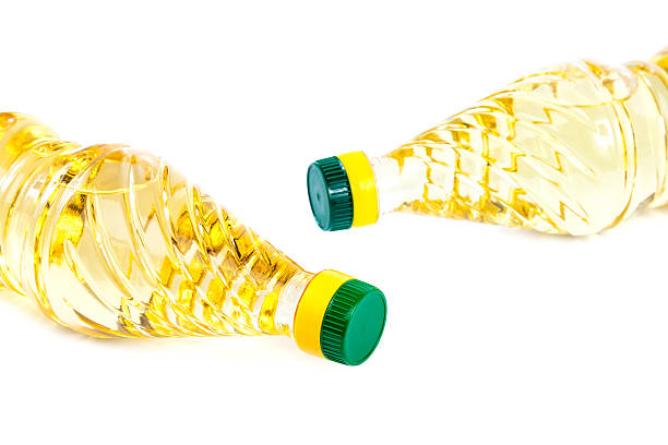 istock Bottle with vegetable oil on white background. 491224272