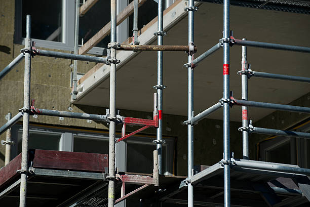 istock Scaffolding on a construction site of a new building 491224826