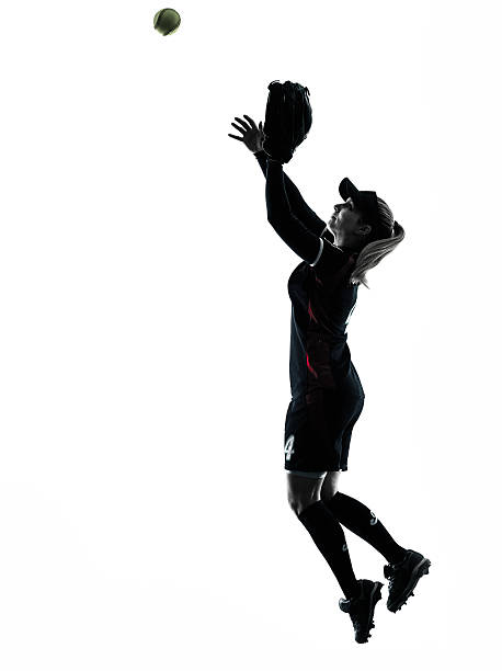 istock woman playing softball players silhouette isolated 491230176