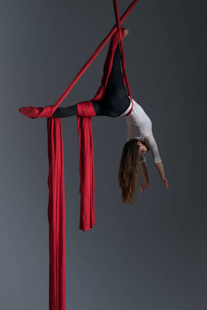 istock Girl performing aerial silk dance 491230238