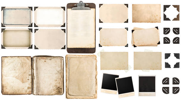 istock Old paper sheets, vintage photo frames and corners, open book 491230560